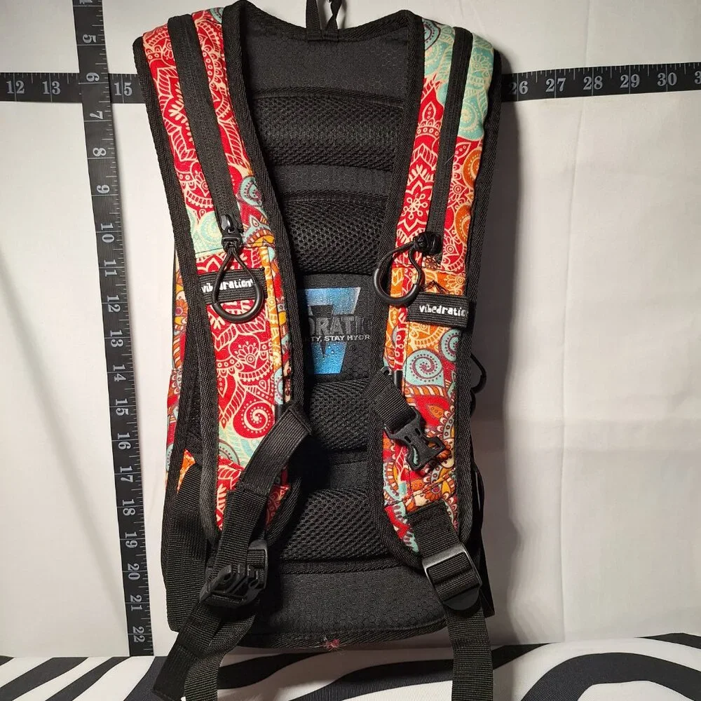 Vibedration Hydration Backpack w/o bladder -turquoise/orange pattern - Used